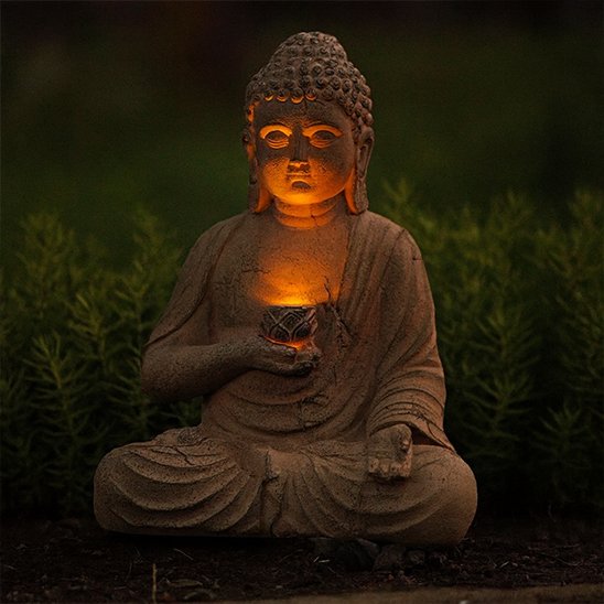 Sculpture jardin buddha en soirée